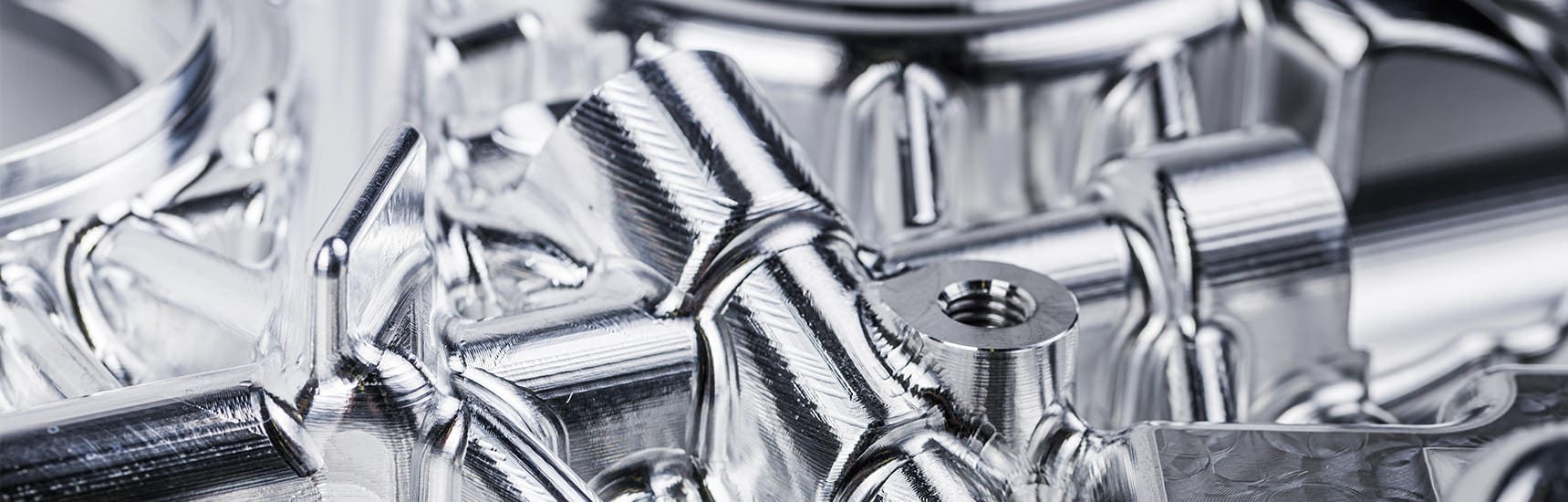 a close up of a shiny metal piece